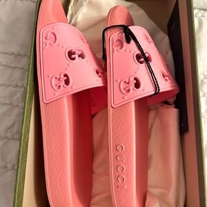Brand new pink Gucci slides size 7 1/2 never worn